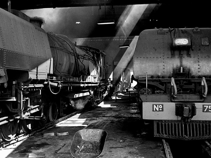 Zimbabwe, Bulawayo. 1986. Garratt steam locomotives at the National Railways of Zimbabwe (NRZ) repair shop.